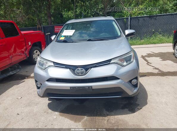 2T3RFREV4JW816785 2018 TOYOTA RAV4 Silver Вид щитка приладів