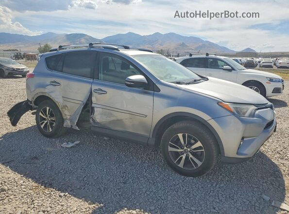 2T3RFREV5GW427288 2016 TOYOTA RAV4 Silver Front right