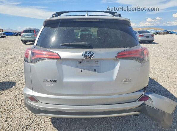 2T3RFREV5GW427288 2016 TOYOTA RAV4 Silver Rear view