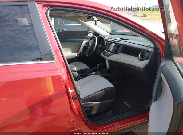2T3RFREV5GW494828 2016 TOYOTA RAV4 Red Front interior view