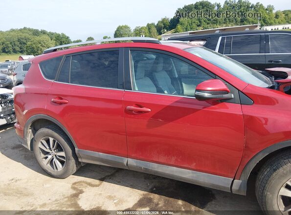 2T3RFREV5GW494828 2016 TOYOTA RAV4 Red Rear interior view