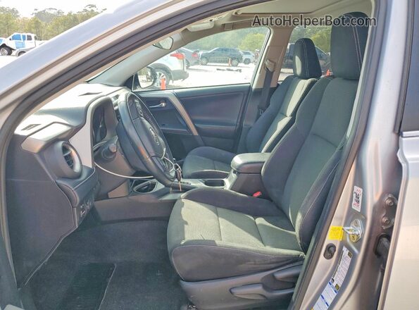2T3RFREV5JW791475 2018 TOYOTA RAV4 Silver წინა სალონის ხედი