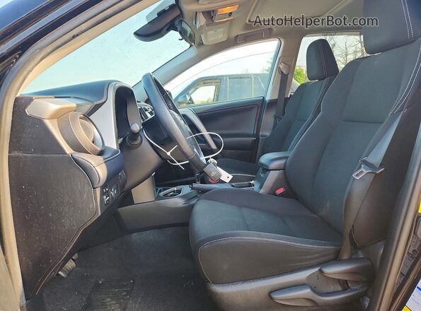 2T3RFREV5JW798569 2018 TOYOTA RAV4 Black Vista interior delantera