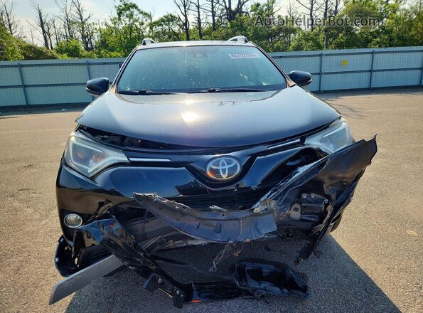 2T3RFREV5JW798569 2018 TOYOTA RAV4 Black Vista frontal