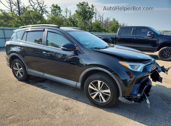 2T3RFREV5JW798569 2018 TOYOTA RAV4 Black Delantero derecho