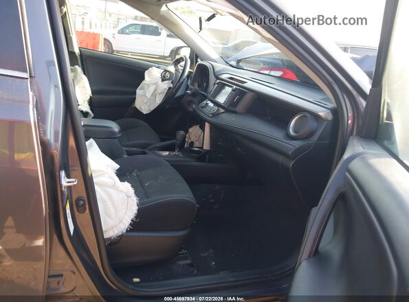 2T3RFREV6GW491565 2016 TOYOTA RAV4 Gray Widok wnętrza z przodu