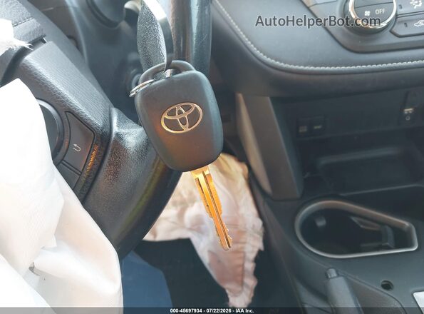 2T3RFREV6GW491565 2016 TOYOTA RAV4 Gray Widok deski rozdzielczej