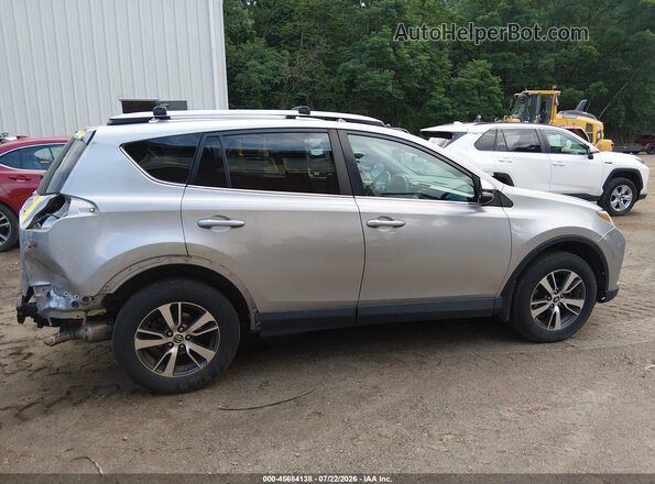 2T3RFREV6HW567335 2017 TOYOTA RAV4 Silver Սալոնի հետևի տեսք
