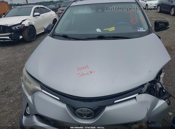 2T3RFREV6HW689788 2017 TOYOTA RAV4 Серебряный Вид сзади