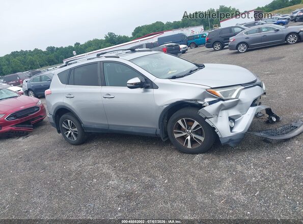 2T3RFREV6HW689788 2017 TOYOTA RAV4 Серебряный Вид задней части салона