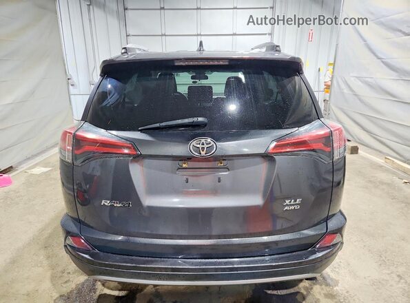 2T3RFREV6JW753673 2018 TOYOTA RAV4 Gray უკანა ხედი