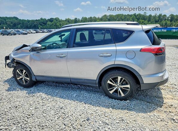 2T3RFREV6JW789802 2018 TOYOTA RAV4 Silver Задня ліва чверть
