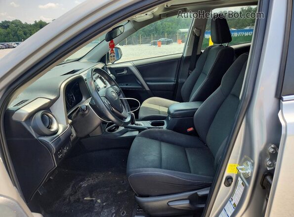 2T3RFREV6JW789802 2018 TOYOTA RAV4 Silver Вид салону спереду