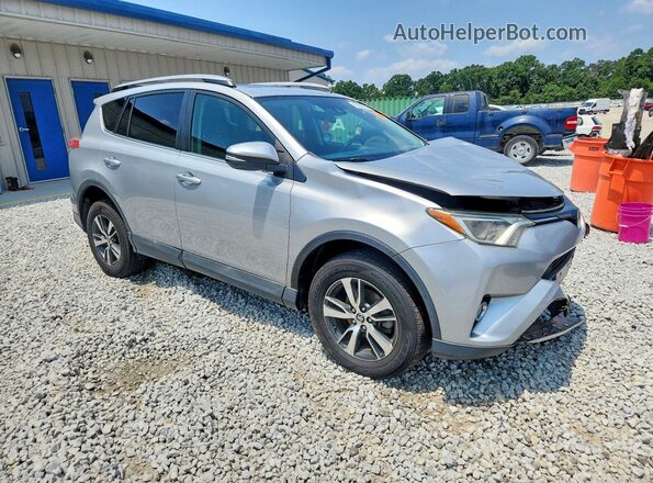 2T3RFREV6JW789802 2018 TOYOTA RAV4 Silver Передня права чверть