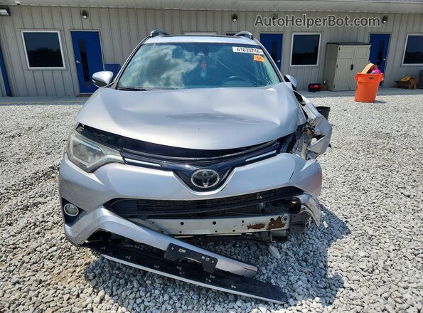 2T3RFREV6JW789802 2018 TOYOTA RAV4 Silver Вид спереду