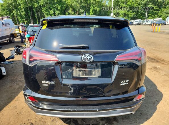 2T3RFREV6JW803195 2018 TOYOTA RAV4 Black Вид ззаду