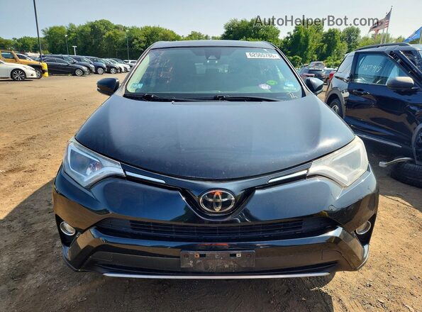 2T3RFREV6JW803195 2018 TOYOTA RAV4 Black Вид спереду