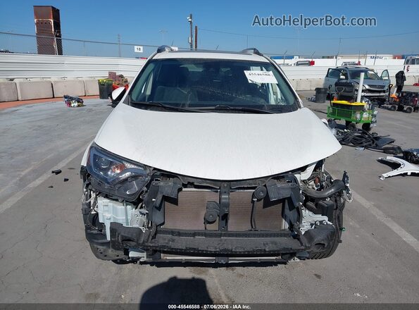 2T3RFREV6JW823687 2018 TOYOTA RAV4 White Widok wnętrza z tyłu