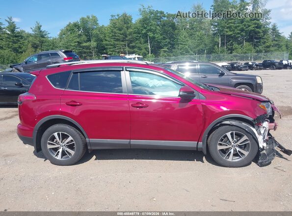 2T3RFREV6JW844152 2018 TOYOTA RAV4 Red Vista interior trasera