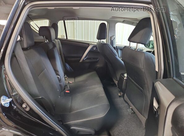 2T3RFREV7HW675981 2017 TOYOTA RAV4 Black Widok wnętrza z tyłu