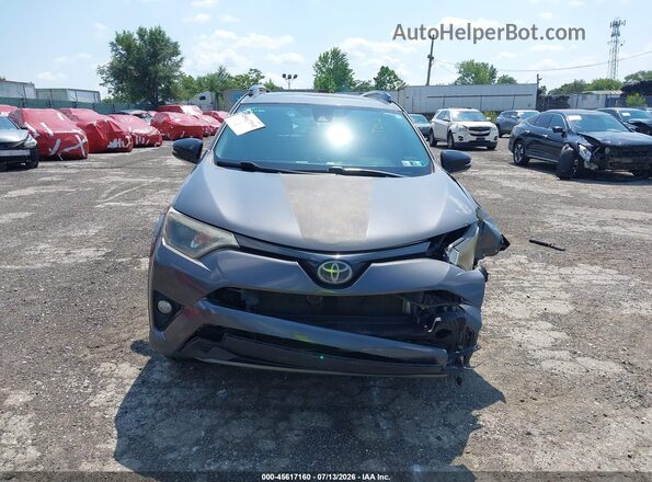 2T3RFREV7JW711917 2018 TOYOTA RAV4 Gray ხელსაწყოთა პანელის ხედი