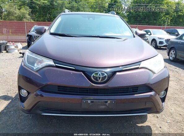 2T3RFREV7JW727308 2018 TOYOTA RAV4 Purple Vista interior trasera