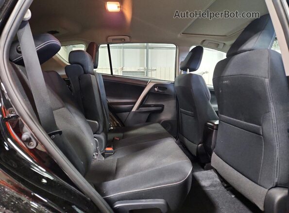 2T3RFREV7JW822760 2018 TOYOTA RAV4 Black Vista interior trasera