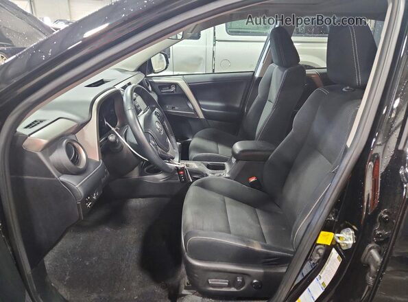 2T3RFREV7JW822760 2018 TOYOTA RAV4 Black Vista interior delantera