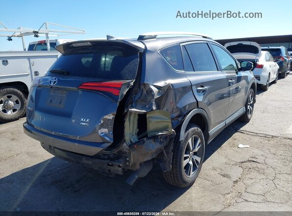 2T3RFREV8GW412350 2016 TOYOTA RAV4 Gray Trasero derecho