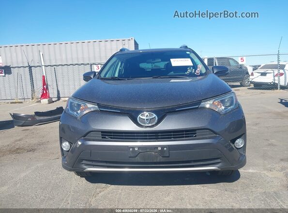 2T3RFREV8GW412350 2016 TOYOTA RAV4 Gray Vista interior trasera