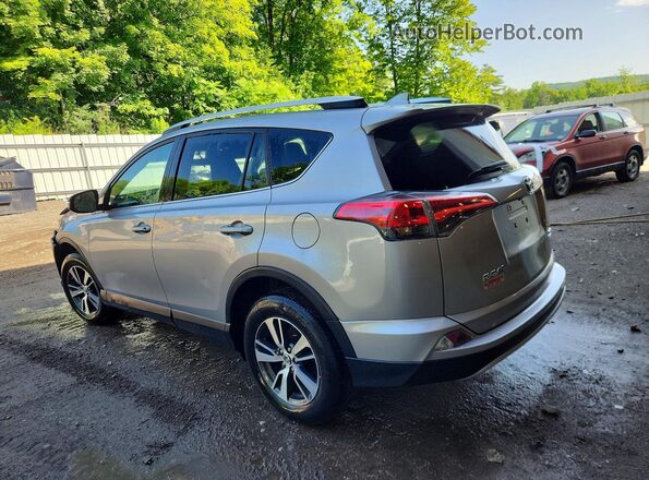 2T3RFREV8GW435630 2016 TOYOTA RAV4 Silver Rear left