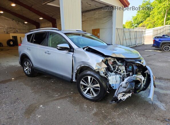 2T3RFREV8GW435630 2016 TOYOTA RAV4 Silver Front right