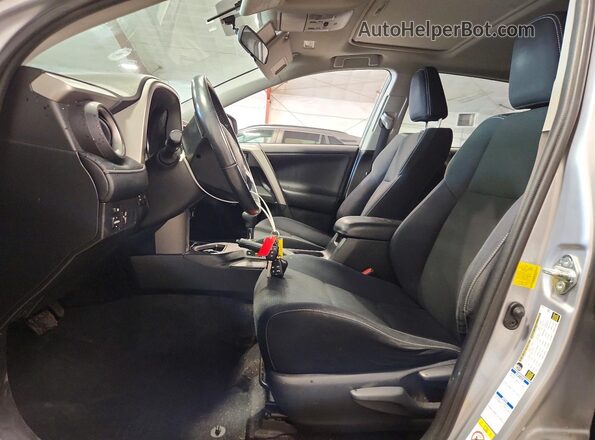 2T3RFREV8GW435630 2016 TOYOTA RAV4 Silver Front interior view