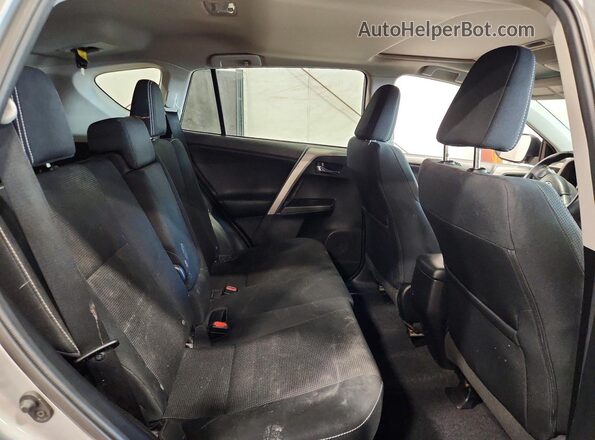 2T3RFREV8GW435630 2016 TOYOTA RAV4 Silver Rear interior view