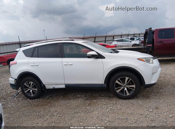 2T3RFREV8GW465565 2016 TOYOTA RAV4 White Widok wnętrza z tyłu