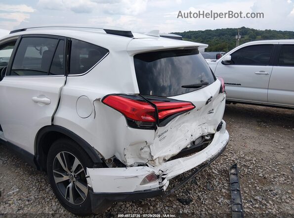 2T3RFREV8GW465565 2016 TOYOTA RAV4 White Widok z przodu