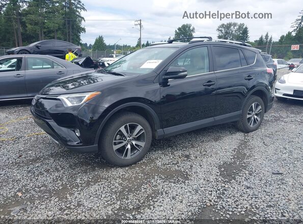 2T3RFREV8GW487646 2016 TOYOTA RAV4 Black Vista tres cuartos delantera izquierda