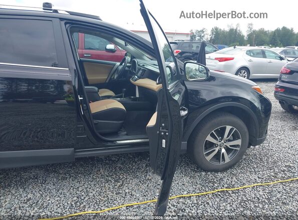 2T3RFREV8GW487646 2016 TOYOTA RAV4 Black Vista interior delantera