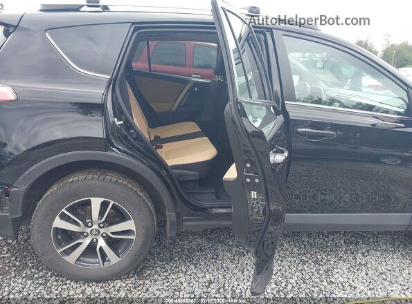 2T3RFREV8GW487646 2016 TOYOTA RAV4 Black Vista de la etiqueta del VIN