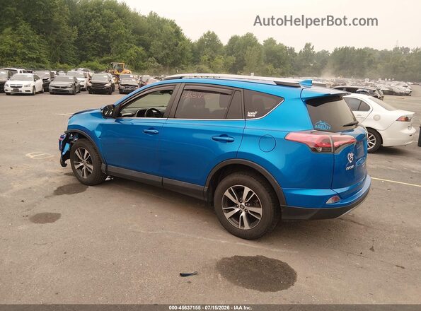 2T3RFREV8HW552884 2017 TOYOTA RAV4 Blue Rear left