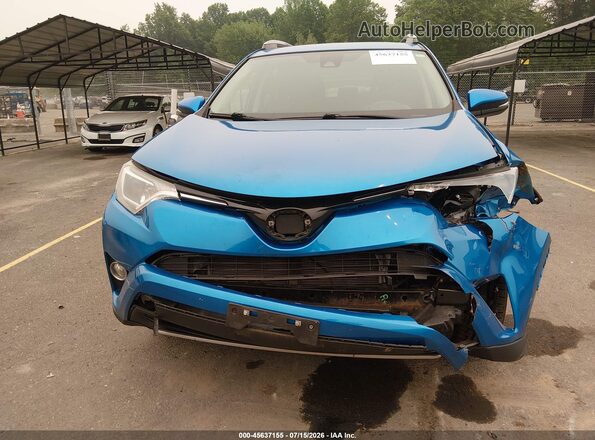 2T3RFREV8HW552884 2017 TOYOTA RAV4 Blue Front view