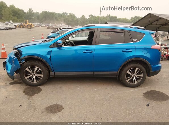 2T3RFREV8HW552884 2017 TOYOTA RAV4 Blue 360 interior view