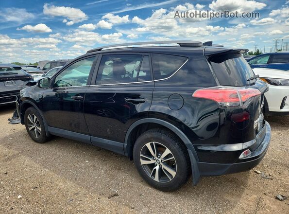 2T3RFREV8HW631486 2017 TOYOTA RAV4 Black Trasero izquierdo