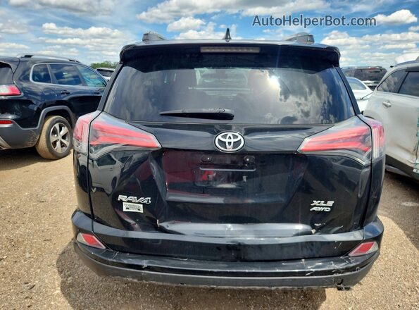 2T3RFREV8HW631486 2017 TOYOTA RAV4 Black Vista trasera