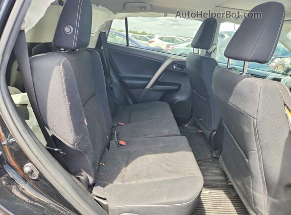 2T3RFREV8HW631486 2017 TOYOTA RAV4 Black Vista de los asientos traseros