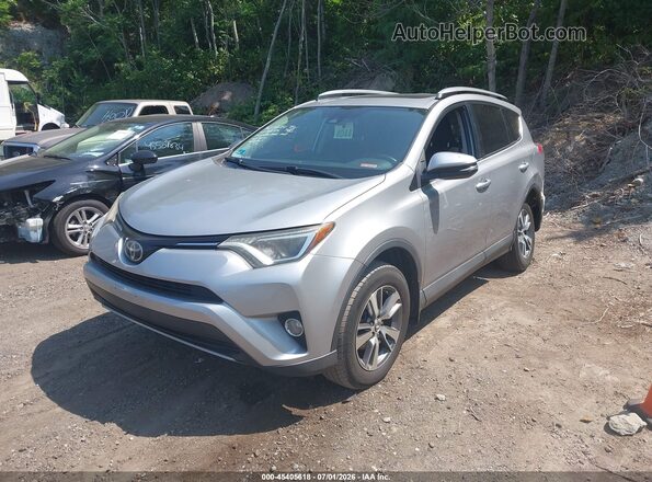 2T3RFREV8HW690652 2017 TOYOTA RAV4 Silver Առջևի ձախ երեք քառորդ տեսարան