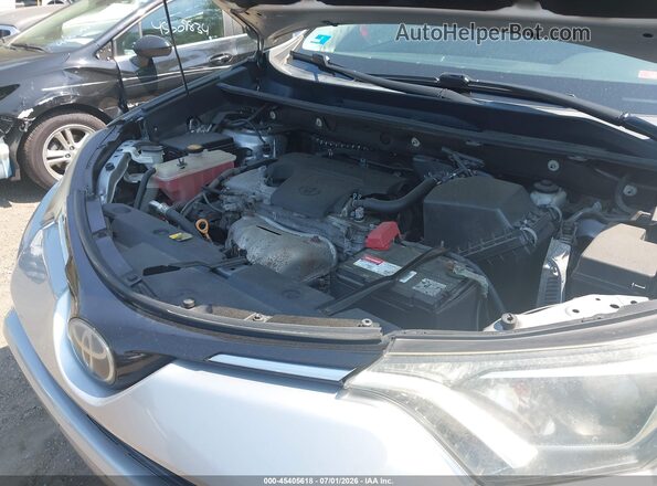 2T3RFREV8HW690652 2017 TOYOTA RAV4 Silver Հետևի տեսք