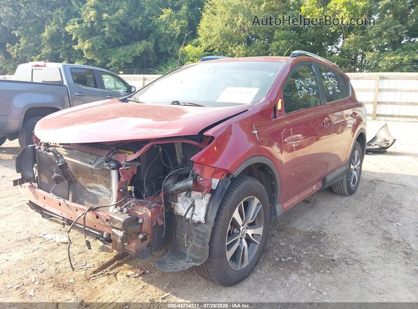 2T3RFREV8JW704961 2018 TOYOTA RAV4 Red Առջևի ձախ երեք քառորդ տեսարան
