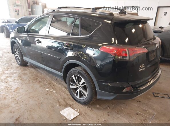 2T3RFREV8JW732159 2018 TOYOTA RAV4 Black Rear left