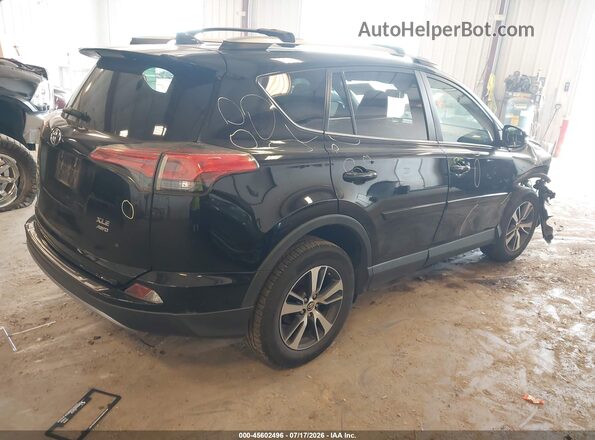 2T3RFREV8JW732159 2018 TOYOTA RAV4 Black Rear right